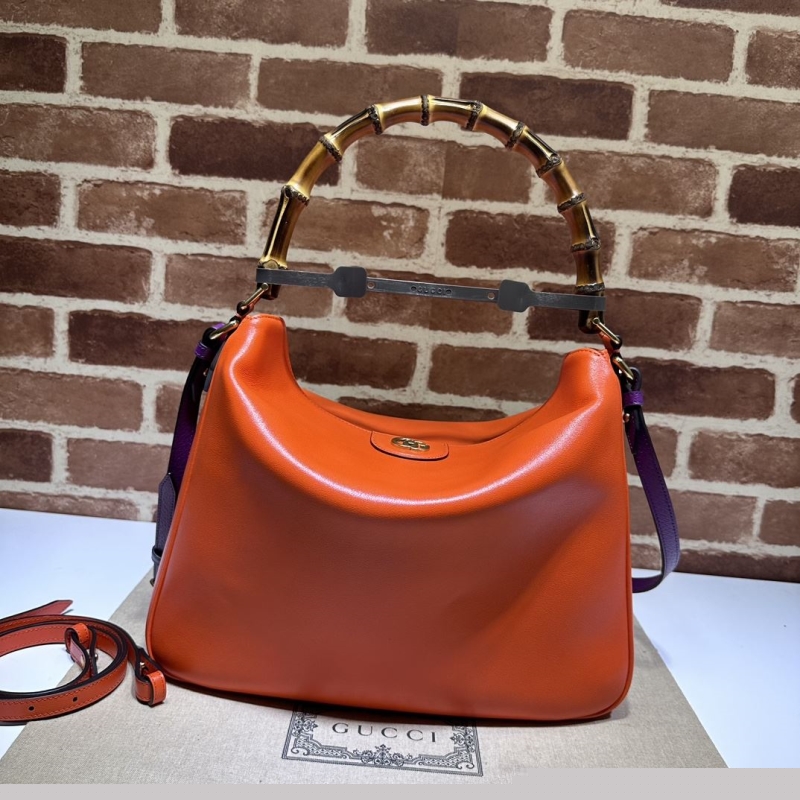 G*u*i top handle bags
